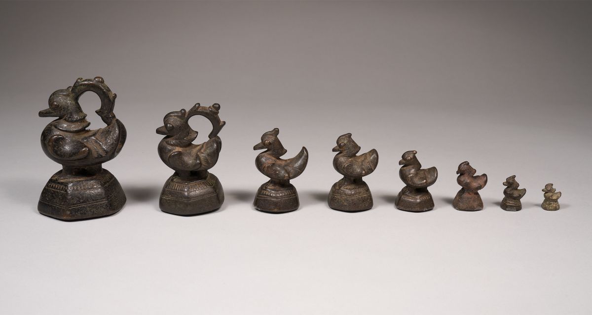 <?php echo Set of 8 Opium Weights?>